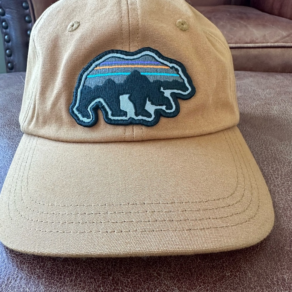 Patagonia rust colored Cap with Bear Patch